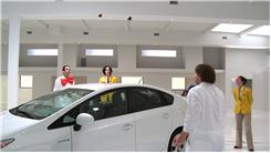 Longest Two-Person Juggling Session Over A Prius