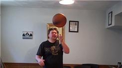 Most Catches Juggling Three Balls In A Shower Pattern While Spinning A Basketball On A Mouthstick Held In Mouth