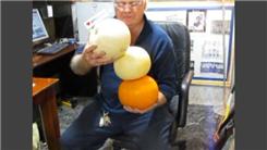 Longest Time To Balance Three Pumpkins On Left Hand
