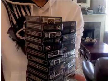 Most Decks Of Cards Held In Hand At Once