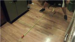 Fastest Time To Push A Candy Bar Four Feet Using Banana Dangling From Waist
