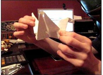 Fastest Time To Make A Paper Crane While Wearing A Sci-Fi Helmet Or Mask