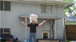 Most Towels Balanced On Head While Balancing On A Rola Bola