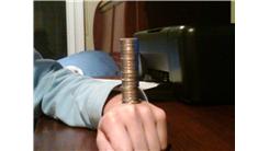 Tallest Nickel Tower Balanced On Hand