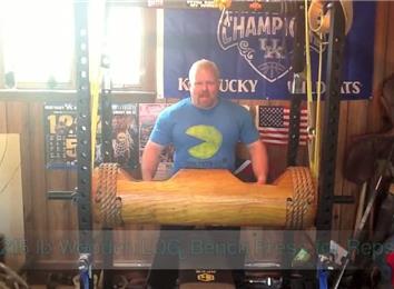 Most Reps Bench Pressing A 215-Pound Wooden Log