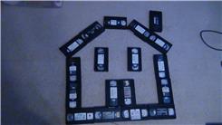 Most VHS Tapes Used To Form A 2D House