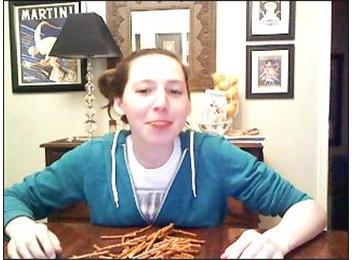 Most Pretzels Sticks Stuck Out Of Mouth