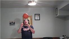 Longest Time To Spin A Mini Basketball On A Mouthstick Held In Mouth