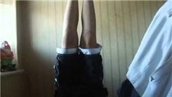 Longest Headstand While Wearing Mismatched Socks