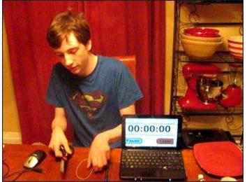 Fastest Time To Build A Weapon With A Pen, Rubber Band And Scissors While Being Hit By Simulated Snowballs