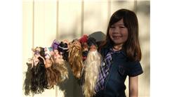 Most Bratz Dolls Balanced On Arm At Once