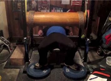 Most Reps Bench Pressing A 345-Pound Wooden Log