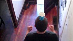 Most Stairs Descended While Balancing A Cup of Water On Head