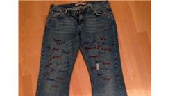 Most Words Written On A Pair Of Jeans