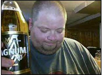 2 40 Oz Bottles Of Malt Liquor