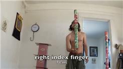 Tallest Soda Can Tower Balanced On Right Index Finger