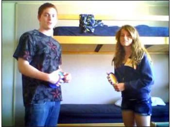 Fastest Time For Red Headed Siblings To Eat Two Packs Of Smarties While Playing Velcro Catch