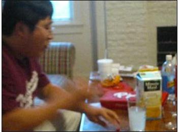 Fastest Time To Drink Eight Ounces Of Lemonade With 20 Peanut M&M\'s In Mouth