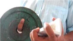 Most Revolution 2 Card Cuts In 30 Seconds While Holding A 15-Pound Exercise Plate With Index Finger
