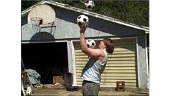Most Catches Juggling Four Soccer Balls Over One's Head