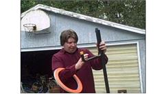Most Consecutive Successful Ring Tosses Onto A 60 Inch Pole Being Balanced On Forehead