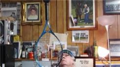 Longest Time To Balance A Puck On Top Of A Tennis Racket Handle On Thumb