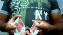 Most Two-Handed Reverse Scissor Card Cuts In 30 Seconds