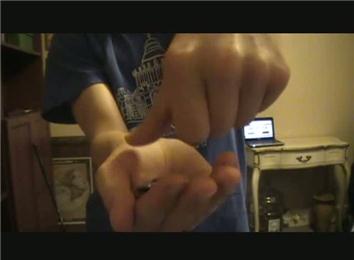 Most Nickels Held In One Hand