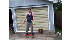 Most Catches While Juggling Three Balls And Using Two Tennis Rackets As Hands While Balancing On A Rola Bola