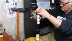 Tallest Golf Ball Tower Stacked On A Wine Bottle