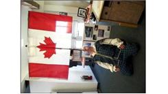 Longest Time To Balance Canadian Flag On Chin While Listening To 'God Bless Canada'