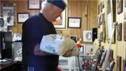 Longest Time To Balance A 10-Pound Bag Of Potatoes On Back Of Hand