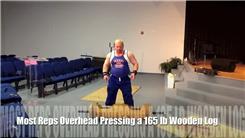 Most Overhead Presses Using A 165-Pound Wooden Log