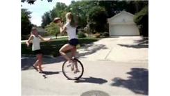 Most Consecutive Football Catches While Riding A Unicycle