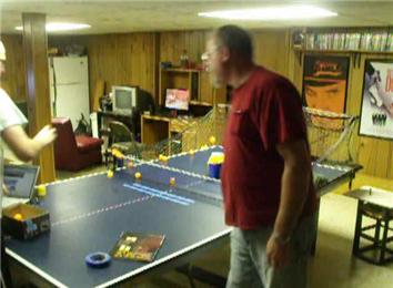 Most Table Tennis Balls Bounced Into Cups In One Minute