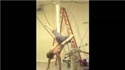 Longest One-Armed Handstand While Assistant Spins Around With A Balancing Ball On Face