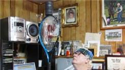Longest Time Balancing Five Hockey Pucks On Top Of A Tennis Racket On Thumb