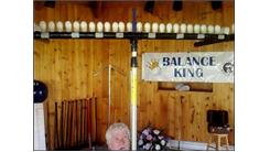 Most Eggs Balanced On Chin