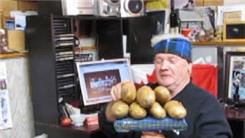 Longest Time Balancing Seven Potatoes On Top Of A Pole On Chin While Listening To "Bud The Spud" By Stompin' Tom Connors