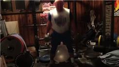Most Stability Ball Squats In 15 Seconds While Holding Two 50-Pound Dumbbells