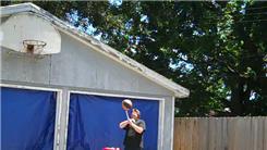 Most Juggling Clubs Juggled While Spinning A Basketball On A Mouthstick Held In Mouth And Standing On A Rola Bola