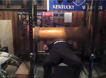 Most Reps Bench Pressing A 305-Pound Wooden Log