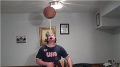 Most Consecutive Catches Juggling Three Basketballs While Spinning A Basketball On A Mouthstick Held In Mouth 
