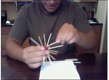 Most Toothpicks Stuck In A Grape In 30 Seconds