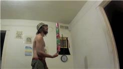 Most 360-Degree Rotations While Balancing Five Cans On Right Index Fingertip