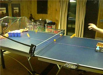 Most Table Tennis Balls Bounced Into Cups In One Minute