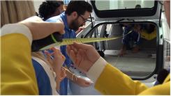 Longest Pasta Strand Suspended Between Two People's Mouths In A Prius