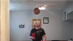 Most Catches While Juggling Three Clubs And Spinning A Basketball On A Mouthstick Held In Mouth