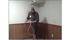 Most Consecutive Tennis Ball Bounces On Base Of Tennis Racket Handle