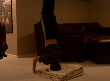 Fastest Time To Count To 50 While Doing A Headstand